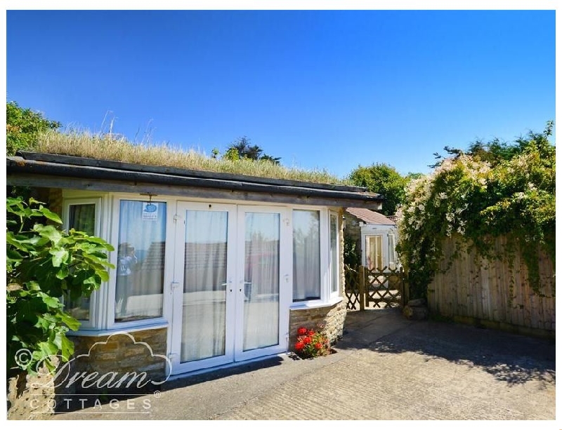 Click here for more about Mimosa Cottage